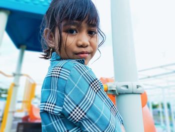 Portrait of cute girl looking at camera