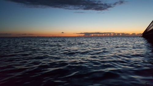 Scenic view of sea at sunset