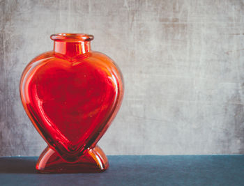 Close-up of red heart shape decoration on table