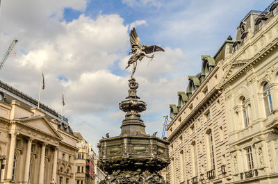 Eros statue at piccadilly circus, iconic landmark in london, uk