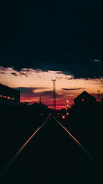 Silhouette of road at sunset