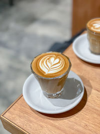 Close-up of cappuccino on table