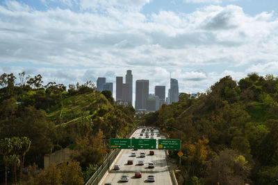 Modern buildings in city against sky