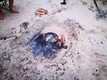 High angle view of bonfire on sand