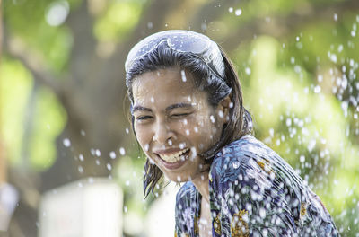 Close-up of smiling young woman