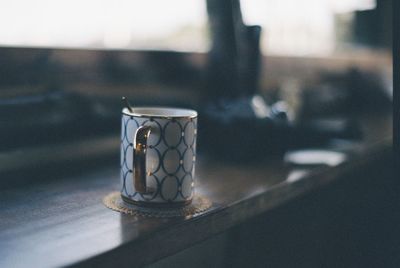 Close-up of glass on table at home