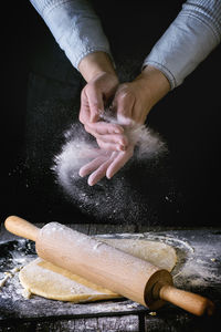 Midsection of man preparing food