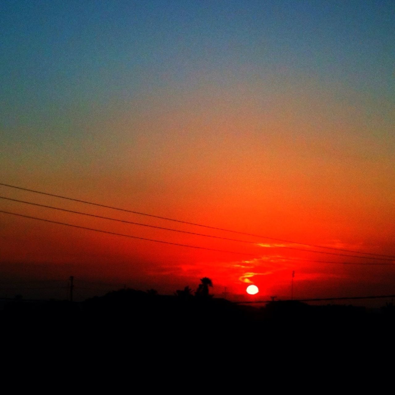 sunset, silhouette, orange color, power line, electricity pylon, scenics, beauty in nature, tranquil scene, tranquility, sky, electricity, power supply, nature, idyllic, landscape, sun, cable, connection, copy space, dark