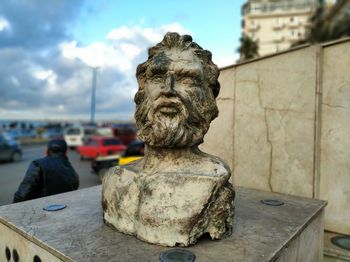 Close-up of statue against sky