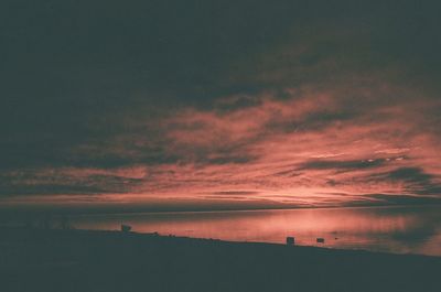 Scenic view of sea against sky at sunset