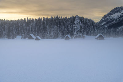 Scenic view of snowcapped mountains against sky during winter