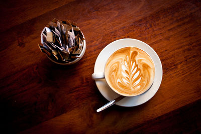 High angle view of cappuccino on table