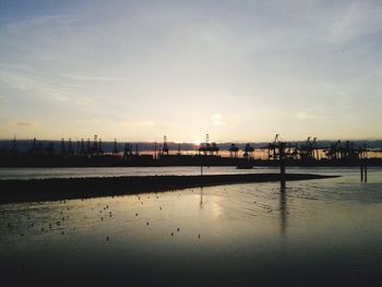 Scenic view of sea against sky at sunset