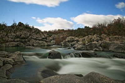 Scenic view of river against sky