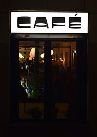 Information sign in city at night