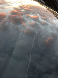 Close-up of water against sky at sunset