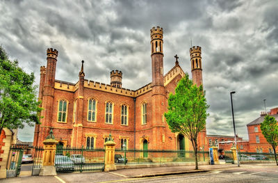 Exterior of historic building against sky in city