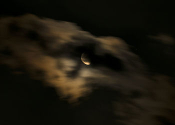 Scenic view of moon against sky at night