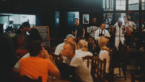 Group of people looking at store