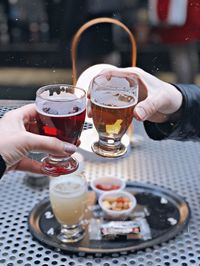 Close-up of hands holding drink