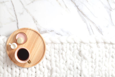 Directly above shot of coffee cup on table