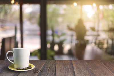 Close-up of coffee cup on table in cafe
