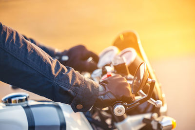 Close-up of man riding motorcycle