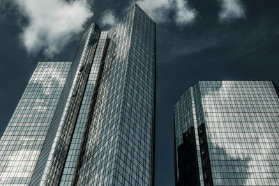 Low angle view of modern buildings against sky