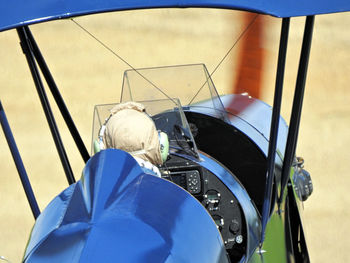 High angle view of man in biplane