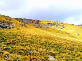 View of landscape against cloudy sky