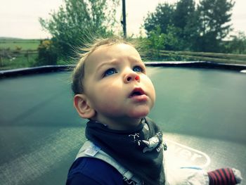 Thoughtful daydream on a trampoline