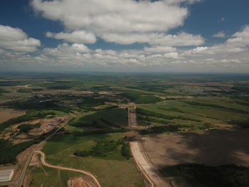 High angle view of road amidst landscape against sky