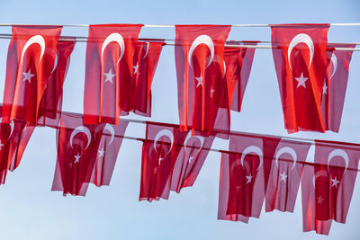 Moon and starry red turkish flag and blue sky