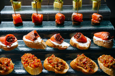 A display case filled with different types of appetizers