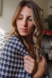 Portrait of beautiful woman at home