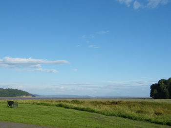 Scenic view of sea against blue sky