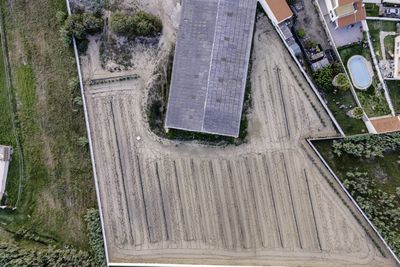 High angle view of lawn by building