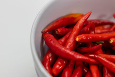 Close-up of red chili peppers in bowl