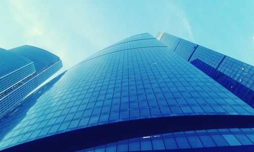 Low angle view of modern building against sky