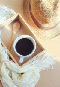 High angle view of coffee cup on table