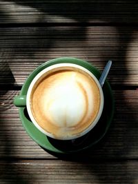 Close-up of cappuccino on table