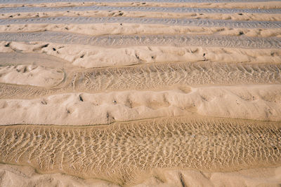 High angle view of sand at beach