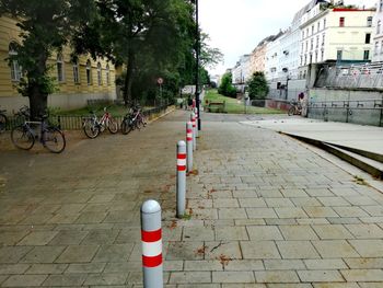 Bicycle parked on street in city