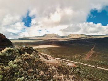 Scenic view of land against sky