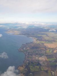 Aerial view of cityscape against sky