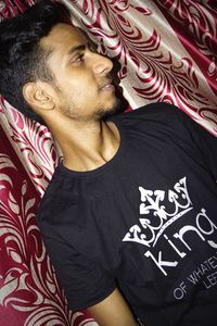 Portrait of young man looking away