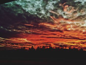 Scenic view of dramatic sky during sunset