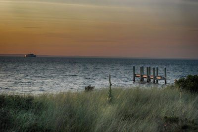 Scenic view of sea at sunset