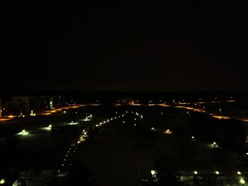 View of illuminated city at night