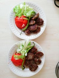 High angle view of salad in plate on table